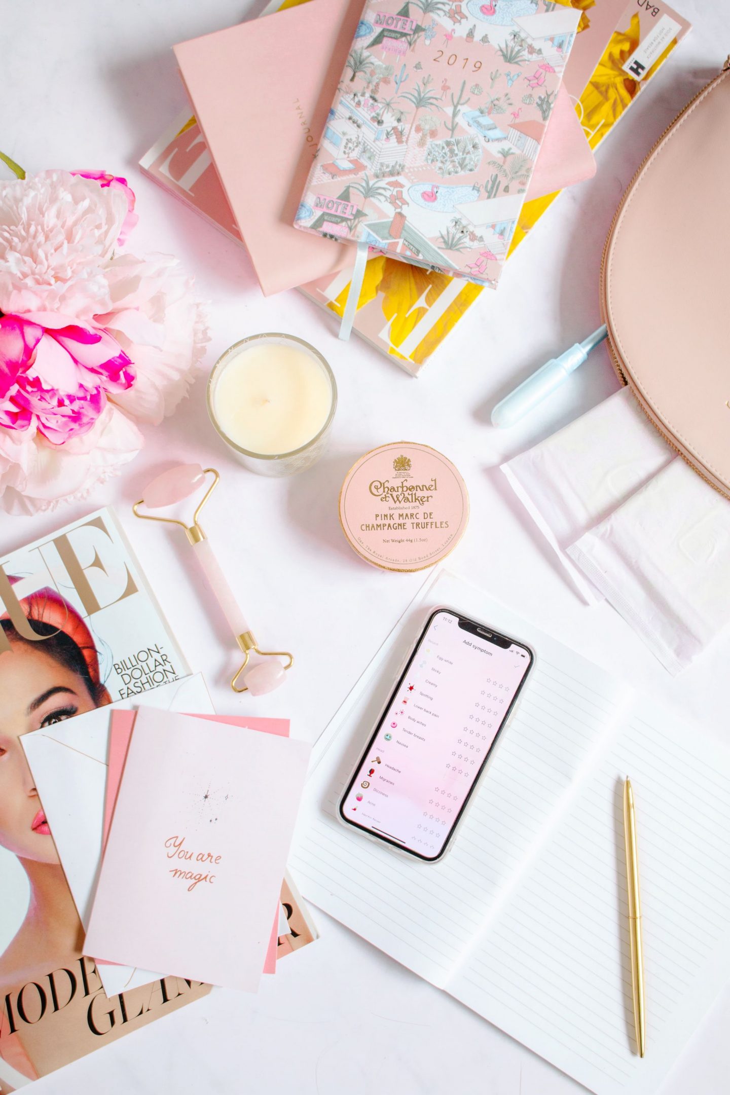 flatlay, pink flatlay, what happens day by day of your menstrual cycle 